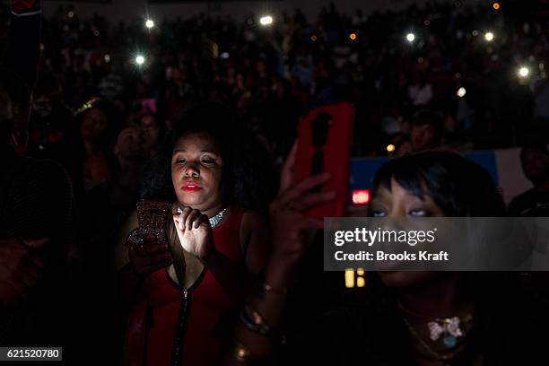 Members of the audience on mobile devices at a concert for Democratic Presidential candidate Hillary Clinton, November 4, 2016 in Cleveland, OH