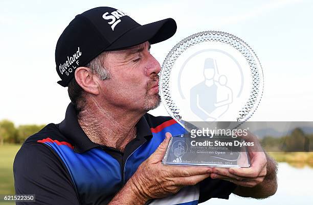 Rod Pampling of Australia celebrates with the winner's trophy after the final round of the Shriners Hospitals For Children Open on November 6, 2016...