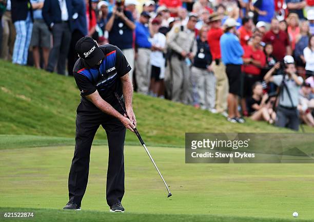 Rod Pampling of Australia putts for birdie to win on the 18th green during the final round of the Shriners Hospitals For Children Open on November 6,...