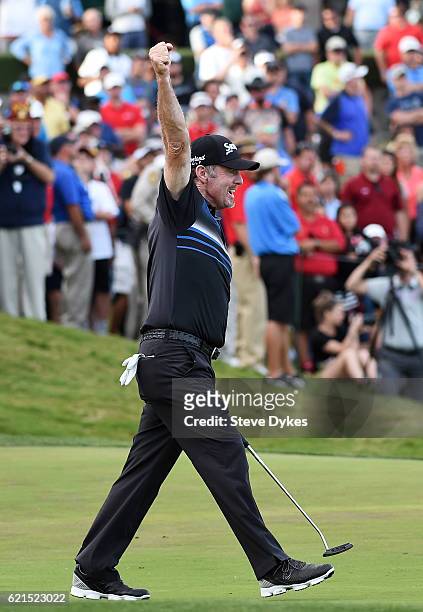 Rod Pampling of Australia celebrates after putting for birdie to win on the 18th green during the final round of the Shriners Hospitals For Children...