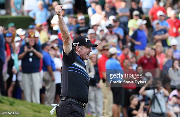 Rod Pampling of Australia celebrates after putting for birdie to win on the 18th green during the final round of the Shriners Hospitals For Children...