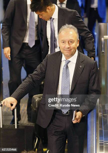 Japan - Japan national soccer team coach Alberto Zaccheroni is seen at Narita airport, near Tokyo, on June 6 ahead of the team's departure for Doha....