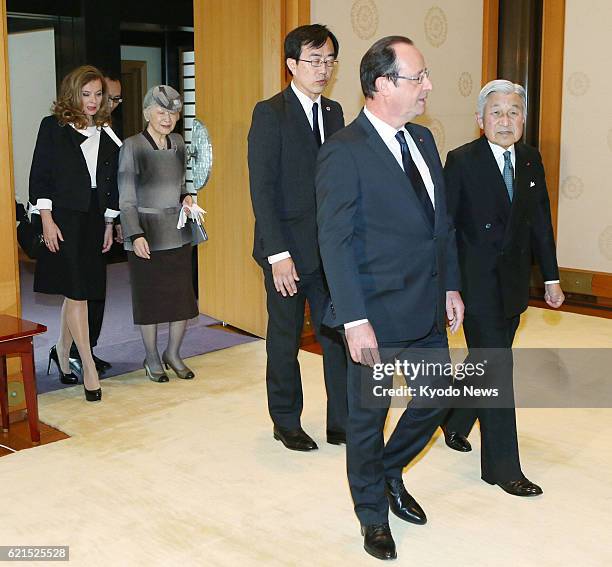 Japan - Japanese Emperor Akihito and Empress Michiko escort French President Francois Hollande and his partner Valerie Trierweiler for their talks at...