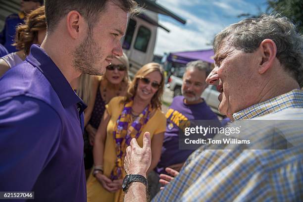 John Kennedy, Republican candidate for the U.S. Senate from Louisiana, greets fans at a tailgate party before a football game between the Louisiana...