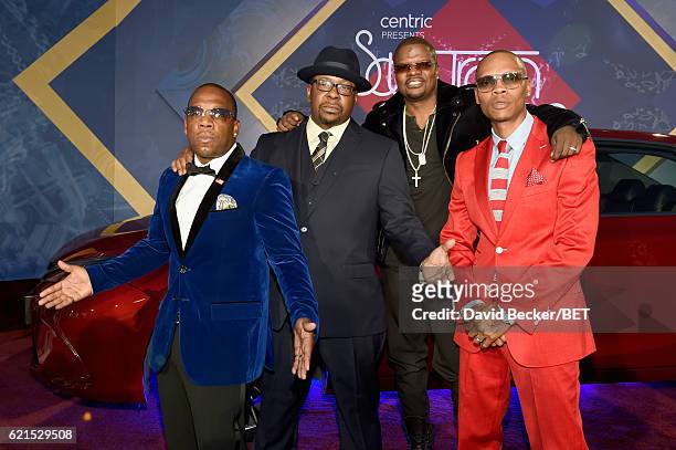 Singers Michael Bivins, Bobby Brown, Ronnie DeVoe and Ricky Bell of New Edition attend the 2016 Soul Train Music Awards at the Orleans Arena on...