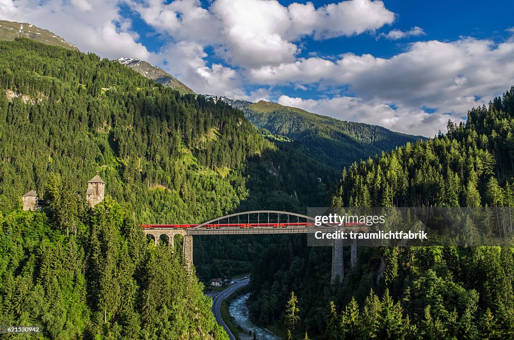 OEBB Railjet train passing a bridge in Tyrol