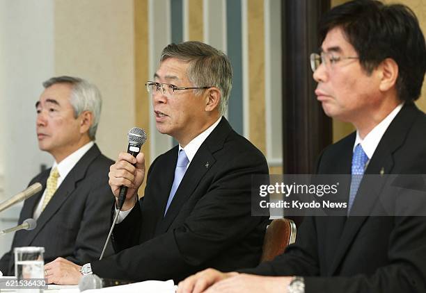 Japan - Shigeru Murayama , the new president of Kawasaki Heavy Industries Ltd., holds a press conference at a Tokyo hotel on the night of June 13...