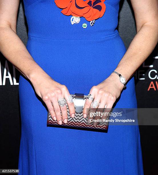 Host Bellamy Young, purse/jewelry detail, attends the Hamilton Behind The Camera Awards presented by Los Angeles Confidential Magazine at Exchange LA...