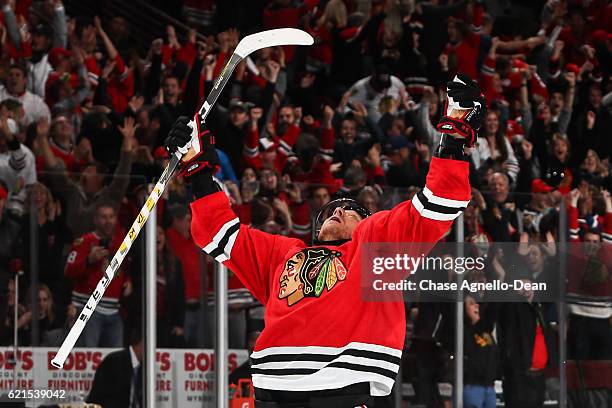 Marian Hossa of the Chicago Blackhawks reacts after scoring the game-winning goal in overtime against the Dallas Stars at the United Center on...