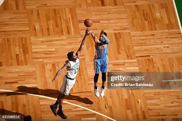 Jamal Murray of the Denver Nuggets shoots the ball against James Young of the Boston Celtics on November 6, 2016 at the TD Garden in Boston,...