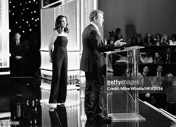 Actor Hugh Grant accepts the Hollywood Supporting Actor Award recipient for "Florence Foster Jenkins" from actress Andie MacDowell onstage during the...