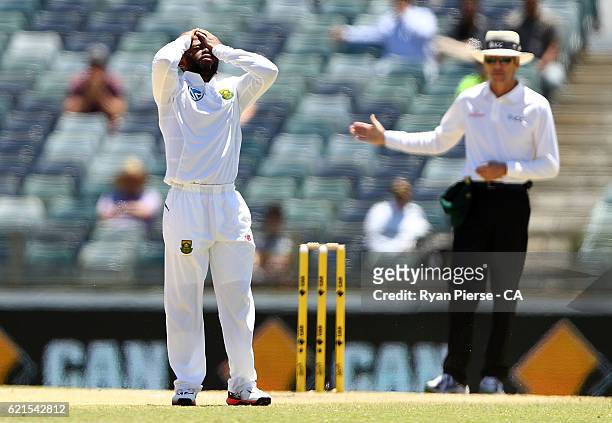 Temba Bavuma of South Africa reacts after his first delivery and possible LBW appeal against Usman Khawaja of Australia was called a no ball by...