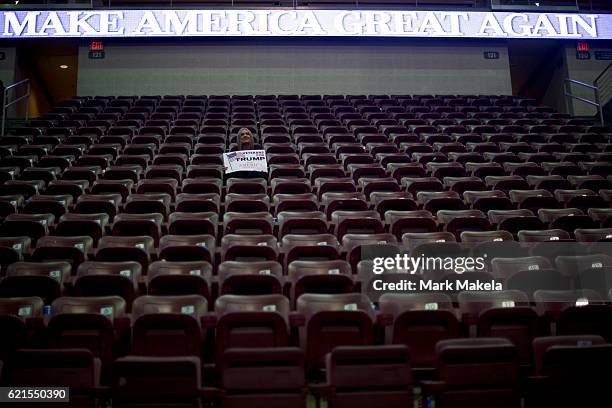 Lone supporter remains after Republican Presidential nominee Donald J. Trump held a rally at Giant Center November 4, 2016 in Hershey, Pennsylvania....