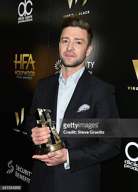 Recording artist Justin Timberlake, recipient of the Hollywood Song Award for Troll's 'Can't Stop The Feeling', poses in the press room at the 20th...