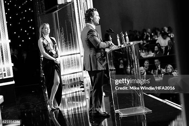 Actor Matthew McConaughey accepts the Hollywood Ensemble Award for "Gold" from actress Kate Hudson onstage during the 20th Annual Hollywood Film...