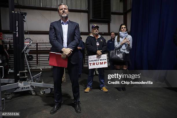 Liberty University President Jerry Falwell Jr. And campaign spokesperson Hope Hicks listen to Republican presidential nominee Donald Trump during a...