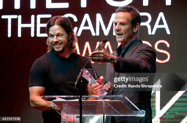 Actor Mark Wahlberg and director Peter Berg speak osntage during the Hamilton Behind The Camera Awards presented by Los Angeles Confidential Magazine...