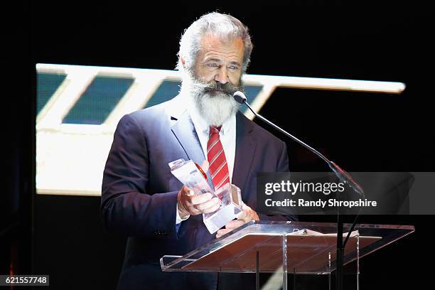 Actor Mel Gibson speaks onstage during the Hamilton Behind The Camera Awards presented by Los Angeles Confidential Magazine at Exchange LA on...