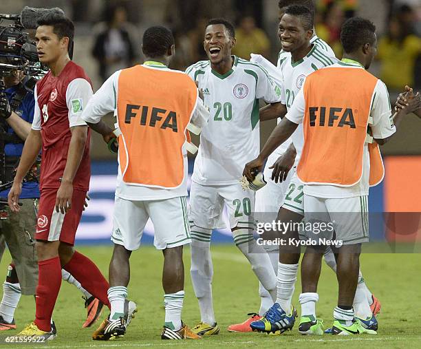 Brazil - Nigeria's and teammates celebrate after winning a Confederations Cup Group B match against Tahiti 6-1 in Belo Horizonte, Brazil, on June 17,...