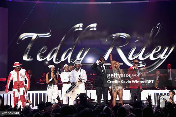 Recording artist Bobby Brown, Deja Riley, recording artists Teddy Riley, Damion Hall, Aqil Davidson, V. Bozeman and Aaron Hall onstage during the...