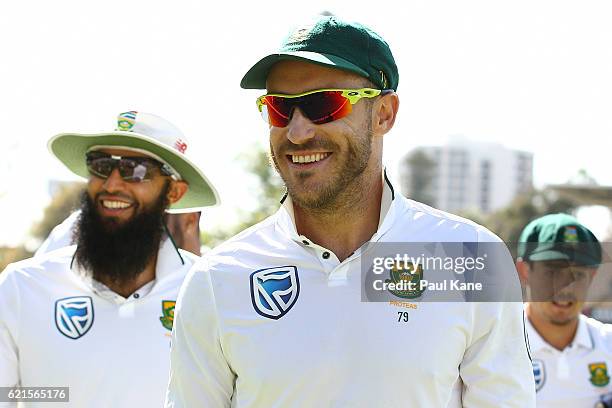 Faf du Plessis of South Africa walks from the field after defeating Australia during day five of the First Test match between Australia and South...