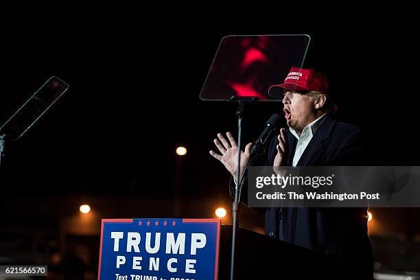 Republican presidential candidate Donald Trump speaks during a campaign event at an Atlantic Aviation hanger in Moon Township, PA on Sunday November...