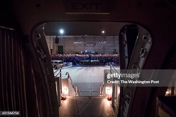 Republican presidential candidate Donald Trump is seen speaking from the inside of his plane during a campaign event at an Atlantic Aviation hanger...