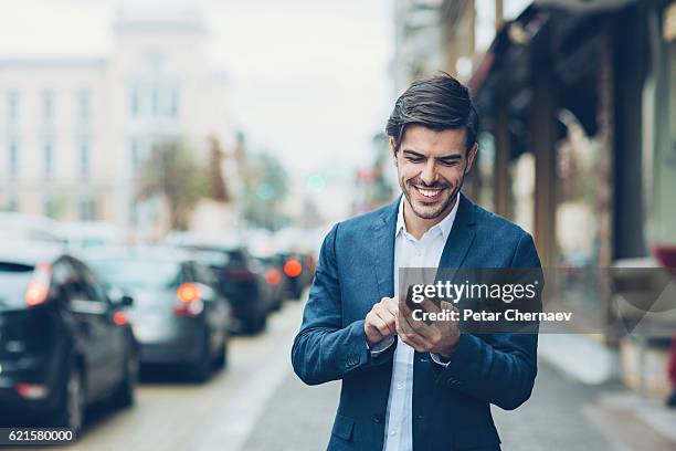 manager - walking business man outside stock pictures, royalty-free photos & images