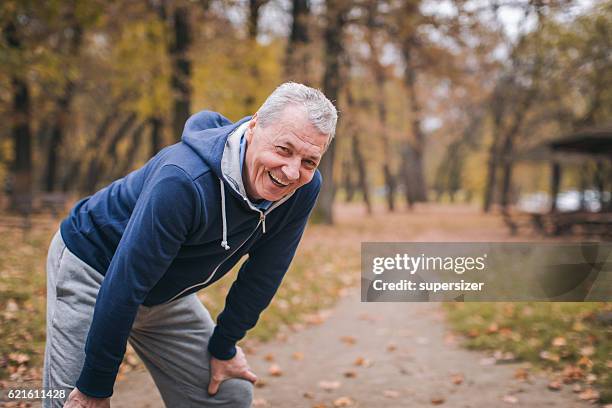 senior man exercizing outdoors - one senior man only stock pictures, royalty-free photos & images