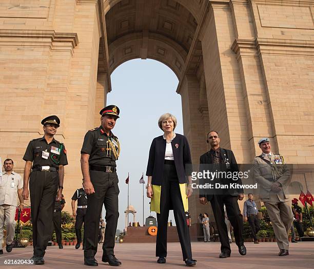 British Prime Minister Theresa May leaves India Gate War memorial after laying a wreath on November 7, 2016 in New Delhi, India. Mrs May is in India...