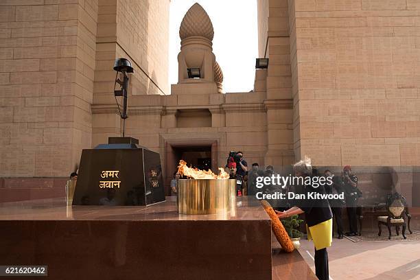 British Prime Minister Theresa May lays a wreath at the India Gate War Memorial on November 7, 2016 in New Delhi, India. Mrs May is in India on a...