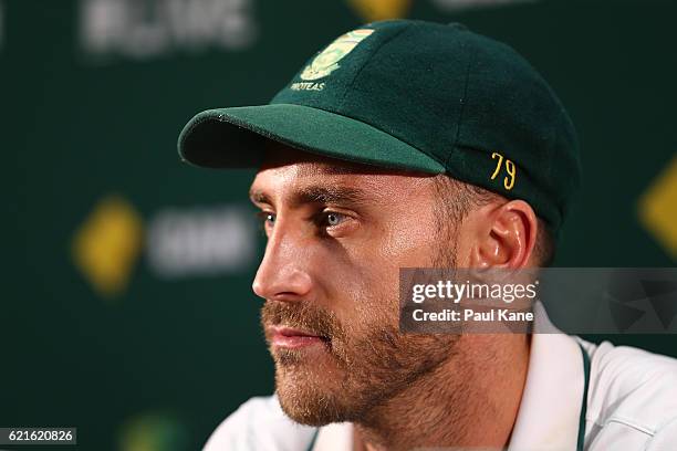 Faf du Plessis of South Africa adresses the media at a press conference after defeating Australia during day five of the First Test match between...