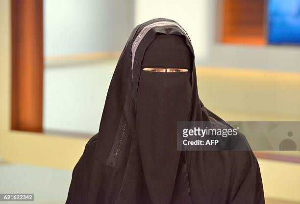 Nora Illi, the women's representative of an unofficial group called the Islamic Central Committee of Switzerland, wears a niqab as she attends a...