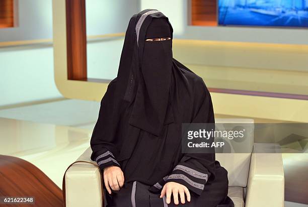 Nora Illi, the women's representative of an unofficial group called the Islamic Central Committee of Switzerland, wears a niqab as she attends a...