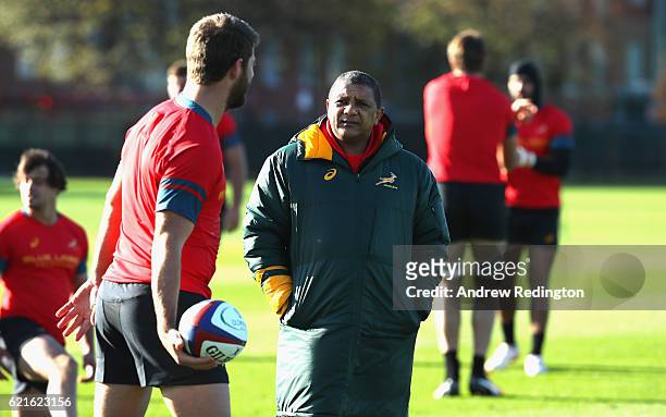 South Africa head coach Allister Coetzee keeps an eye on the session during a South Africa training session at The Latymer Upper School playing...