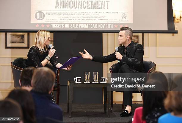 Robbie Williams speaks with Jo Whiley as he announces his new album "The Heavy Entertainment Show" and new tour "The Heavy Entertainment Tour"...