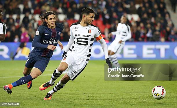 Edinson Cavani of PSG and Pedro Mendes of Rennes in action during the French Ligue 1 match between Paris Saint-Germain and Stade Rennais FC at Parc...