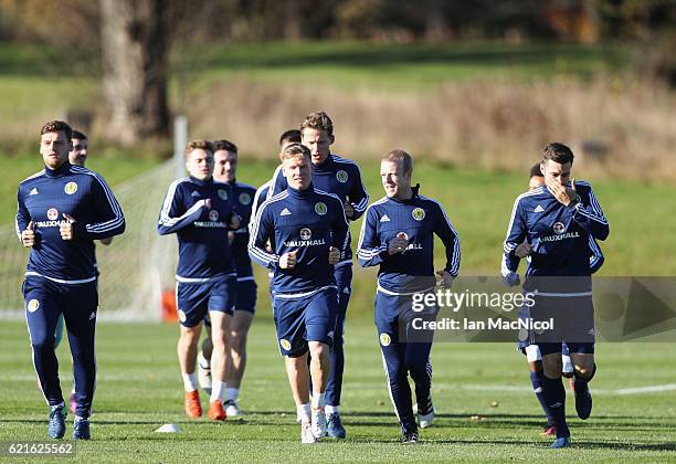 Steven Naismith and Matt Ritchie in discussion as they warm up during a Scotland training session at Mar Hall on November 7, 2016 in Glasgow,...