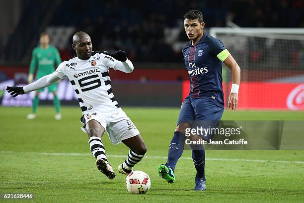 Thiago Silva of PSG and Giovanni Sio of Rennes in action during the French Ligue 1 match between Paris Saint-Germain and Stade Rennais FC at Parc des...