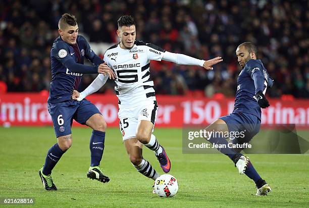 Marco Verratti of PSG, Ramy Bensebaini of Rennes, Lucas Moura of PSG in action during the French Ligue 1 match between Paris Saint-Germain and Stade...