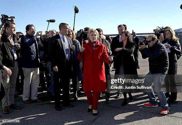 Democratic presidential nominee former Secretary of State Hillary Clinton preapre to board her campaign plane at Westchester County Airport on...