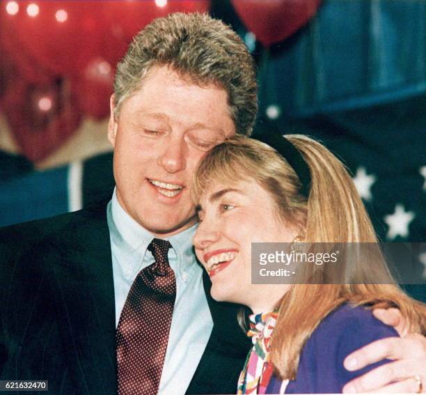 Photo shows then Governor of Arkansas Bill Clinton and his wife Hillary embracing. Clinton has been accused of having an affair with a former White...
