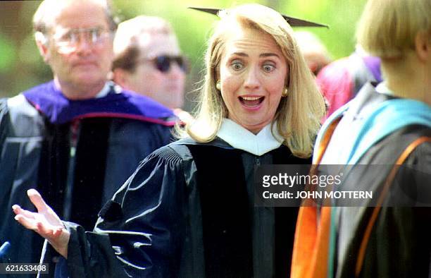 Hillary Clinton, a 1969 graduate of Wellesley College, greets friends in the faculty before joining the academic procession to the 1992 commencement...