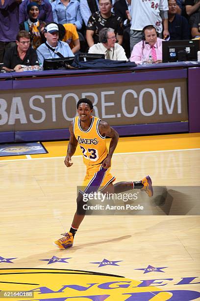 Louis Williams of the Los Angeles Lakers smiles and runs up the court during the game against the Golden State Warriors on November 4, 2016 at...