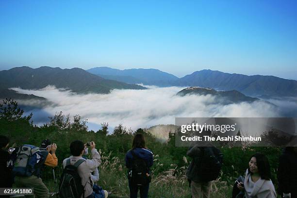 People enjoy he Takeda Castle ruins in the sea of clouds on November 5, 2016 in Asago, Hyogo, Japan. From this year, the Asago city chamber of...