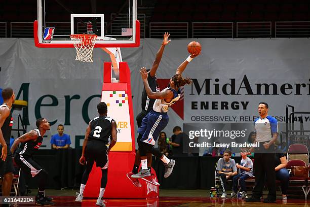 Cartier Martin of the Iowa Energy drives to the basket and shoots the ball against the Windy City Bulls in an NBA D-League pre-season game on...