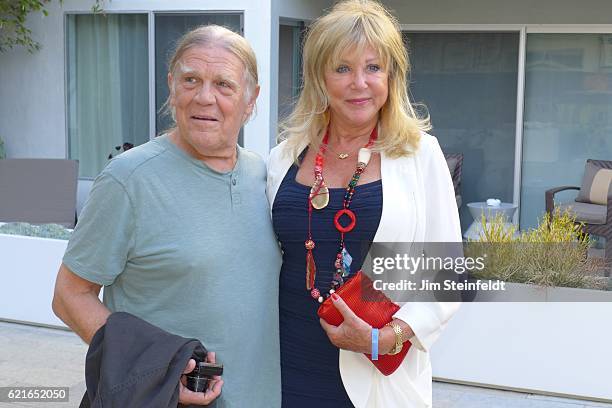 Henry Diltz and Pattie Boyd attend the Pattie Boyd: Newly Discoverd Photo Exhibition at the Morrison Hotel Gallery in Los Angeles, Califorinia on...