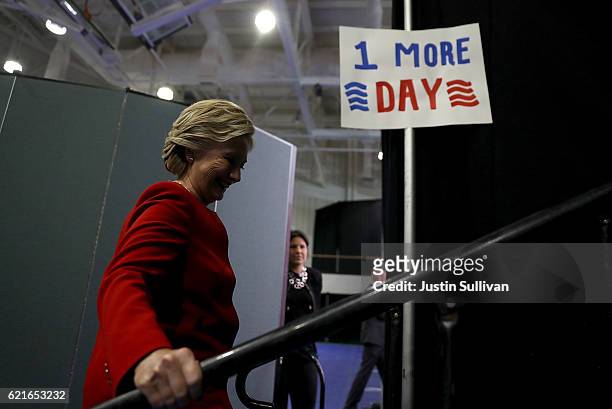 Democratic presidential nominee former Secretary of State Hillary Clinton waits to go on stage during a campaign rally at Grand Valley State...