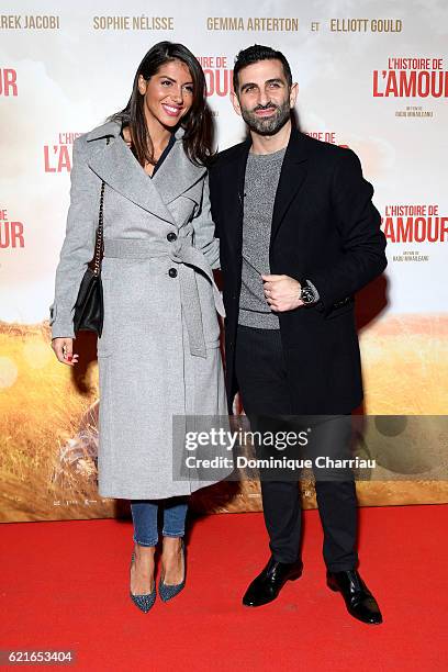 Kheiron and guest attend "L'Histoire de L'Amour" Paris Premiere at Gaumont Capucines on November 7, 2016 in Paris, France.