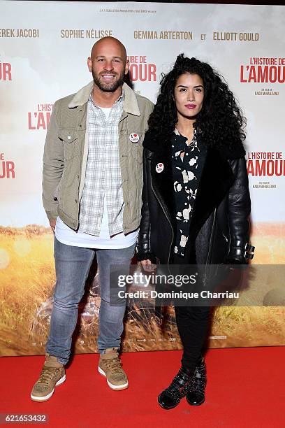 Sabrina Ouazani and Franck Gastambide attend "L'Histoire de L'Amour" Paris Premiere at Gaumont Capucines on November 7, 2016 in Paris, France.